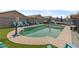 Inviting pool area with lounge chairs, perfect for relaxation and entertainment on a sunny day at 17935 W Louise Dr, Surprise, AZ 85387