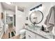 This modern bathroom is equipped with a granite countertop and a vessel sink at 18644 N 21St St, Phoenix, AZ 85024