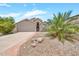 Charming single-story home with desert landscaping, a two-car garage, and a welcoming front entrance at 18644 N 21St St, Phoenix, AZ 85024