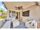 This cozy outdoor patio has comfortable seating and a mounted television at 18644 N 21St St, Phoenix, AZ 85024