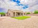 Spacious backyard with artificial turf, low-maintenance landscaping, and great privacy at 22986 S 208Th St, Queen Creek, AZ 85142