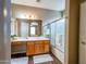 Bathroom with a large vanity, ample counter space, and a shower-tub combo at 22986 S 208Th St, Queen Creek, AZ 85142