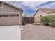Front yard with xeriscaping, bench, and pathway to gate at 22986 S 208Th St, Queen Creek, AZ 85142