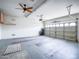 Spacious two car garage with bright lighting, epoxy flooring, and plenty of space at 22986 S 208Th St, Queen Creek, AZ 85142