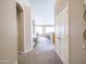 Hallway showcasing the home's neutral color palette and seamless transition into the other living spaces at 22986 S 208Th St, Queen Creek, AZ 85142