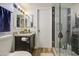 Bathroom featuring glass shower stall, granite counters, and wood look flooring at 2301 E University Dr # 488, Mesa, AZ 85213