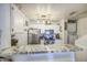 Bright kitchen with stainless steel appliances, granite countertops, and white cabinets at 2301 E University Dr # 488, Mesa, AZ 85213
