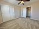 Neutral bedroom with carpet and natural light from open door at 2549 E Desert Trumpet Rd, Phoenix, AZ 85048