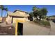Inviting two-story home with manicured lawn, desert landscaping, tile roof, and bright natural light at 2549 E Desert Trumpet Rd, Phoenix, AZ 85048
