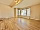 Spacious living room with tile floors, bright natural light and a built in cabinet perfect for storage at 2549 E Desert Trumpet Rd, Phoenix, AZ 85048