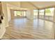 Bright living room featuring large windows, tile flooring, and an open layout, perfect for modern living at 2549 E Desert Trumpet Rd, Phoenix, AZ 85048
