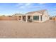 This home offers a covered patio and ample backyard space, perfect for entertaining guests and enjoying the outdoors at 25947 W Oraibi Dr, Buckeye, AZ 85396