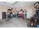 Spacious garage with ample storage, workbench area, and room for multiple vehicles or hobbies at 25947 W Oraibi Dr, Buckeye, AZ 85396