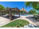 A park view featuring a covered picnic area and splash pad, perfect for Gathering gatherings and community events at 25947 W Oraibi Dr, Buckeye, AZ 85396