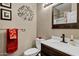 Bathroom with neutral walls, decorative towels, vanity, and toilet at 2758 N Sterling --, Mesa, AZ 85207
