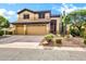 Charming two-story home with a three-car garage and well-maintained desert landscaping at 2758 N Sterling --, Mesa, AZ 85207