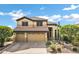 Charming two-story home with a three car garage, desert landscaping, and a tile roof at 2758 N Sterling --, Mesa, AZ 85207