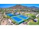 Overhead view of community tennis courts in desert community with mountain views in background at 2758 N Sterling --, Mesa, AZ 85207
