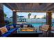 Backyard with a sparkling pool, comfortable seating, and a cozy fire pit for evening relaxation at 2923 N 81St Pl, Scottsdale, AZ 85251