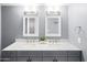 Elegant bathroom with double vanity, marble countertop, and modern fixtures at 2923 N 81St Pl, Scottsdale, AZ 85251