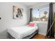 Cozy bedroom with a single bed, gray curtains and zebra art at 2923 N 81St Pl, Scottsdale, AZ 85251