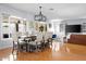 Bright and spacious dining area with a large table, ideal for entertaining, with an open view into the living room at 2923 N 81St Pl, Scottsdale, AZ 85251