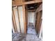 Bathroom under construction, showing exposed framing and partially tiled floor, ideal for custom design at 3125 N 82Nd Pl, Scottsdale, AZ 85251