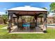 Backyard oasis featuring a sparkling pool, spa, water features, and covered patio area at 3628 E Meadowview Dr, Gilbert, AZ 85298