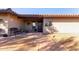 Inviting front entrance with tiled walkway, desert landscaping, and charming details at 36801 N Long Rifle Rd, Carefree, AZ 85377