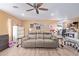 Open living area with hardwood floors, large couch, and plenty of space for fun and relaxation at 36801 N Long Rifle Rd, Carefree, AZ 85377