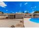 Private backyard featuring a pool, covered patio, gravel landscaping and a low maintenance yard at 3814 W El Camino Dr, Phoenix, AZ 85051