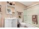 Well-lit bathroom featuring a white vanity, framed mirror, and a shower with sliding glass doors at 3814 W El Camino Dr, Phoenix, AZ 85051