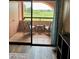 Balcony with outdoor seating overlooks the golf course, perfect for relaxation at 4303 E Cactus Rd # 235, Phoenix, AZ 85032