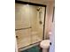 Modern bathroom with glass-enclosed shower and white fixtures at 4303 E Cactus Rd # 235, Phoenix, AZ 85032