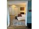 Charming bedroom with carpet flooring, decorative wall art and an open closet at 4303 E Cactus Rd # 235, Phoenix, AZ 85032