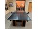Recreation room featuring a sleek ping pong table, cozy seating, and a warm, inviting atmosphere at 4303 E Cactus Rd # 235, Phoenix, AZ 85032