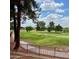 Scenic golf course view from the property showing lush green fairways and mature trees at 4303 E Cactus Rd # 235, Phoenix, AZ 85032