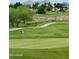 Beautiful golf course view showcasing rolling greens and mountain views at 4303 E Cactus Rd # 235, Phoenix, AZ 85032