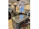 Modern kitchen featuring granite countertops, gray cabinets, stainless steel sink and stainless steel appliances at 4303 E Cactus Rd # 235, Phoenix, AZ 85032
