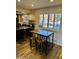 Eat-in kitchen table with natural light and wood floors at 4303 E Cactus Rd # 235, Phoenix, AZ 85032