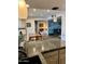 Open concept living room with kitchen, dining and bedroom at 4303 E Cactus Rd # 235, Phoenix, AZ 85032