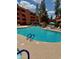 Large community pool features rock waterfall features, seating and plenty of room to swim at 4303 E Cactus Rd # 235, Phoenix, AZ 85032
