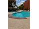 Community pool with multiple seating areas to soak up the sun and enjoy resort style living at 4303 E Cactus Rd # 235, Phoenix, AZ 85032