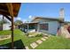 Backyard with a modern artificial turf design at 4323 W Rose Ln, Glendale, AZ 85301