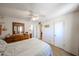 Bright bedroom featuring a ceiling fan and neutral walls at 4323 W Rose Ln, Glendale, AZ 85301