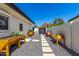 Backyard featuring raised garden beds, a stone pathway, and views of the mountains at 5822 N 44Th Pl, Phoenix, AZ 85018