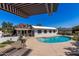 Backyard pool area offering a refreshing oasis with mountain views in the distance at 5822 N 44Th Pl, Phoenix, AZ 85018