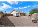 Large backyard featuring a gravel area, fence and RV parking at 6614 S Mckemy St, Tempe, AZ 85283