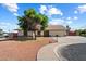 Charming single-story home featuring a well-maintained front yard and an attached two-car garage at 6614 S Mckemy St, Tempe, AZ 85283
