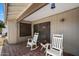 Relaxing covered patio featuring rocking chairs at 6614 S Mckemy St, Tempe, AZ 85283